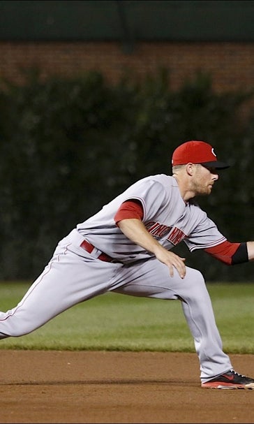 Zack Cozart seeks the gold, as in glove